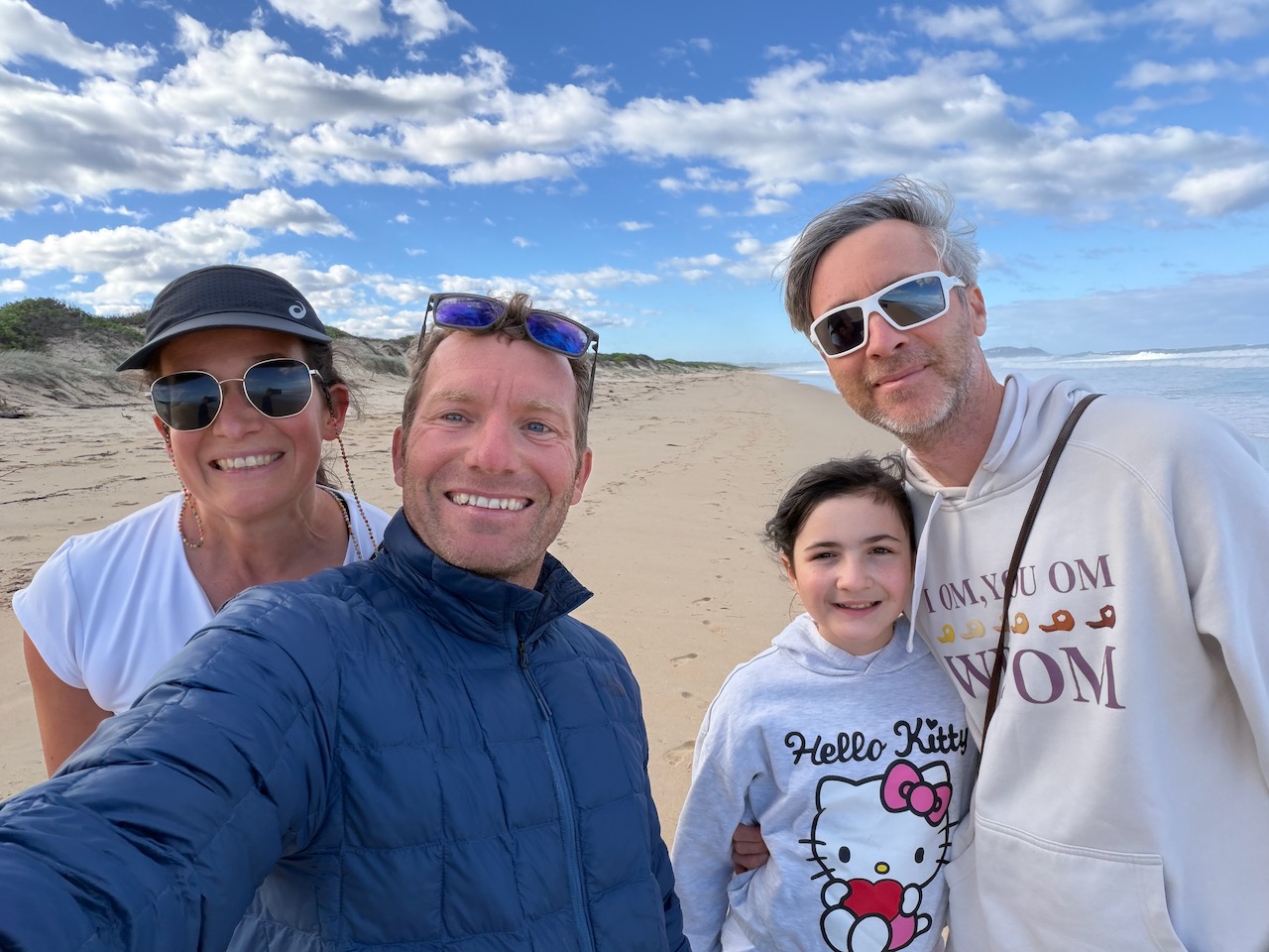 Matt, Christophe, Thea and Steph taking a selfie on the beach near Wollongong.